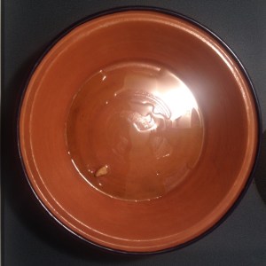 1_Olive oil with a little olive oil in the bottom of a tagine.